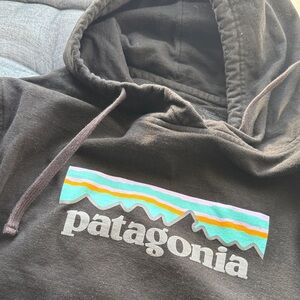 Patagonia Black Hoodie with Vibrant Logo size small S
